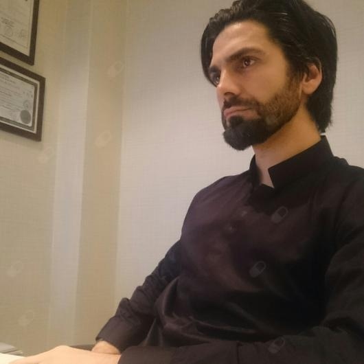 M. Ozan Kiki