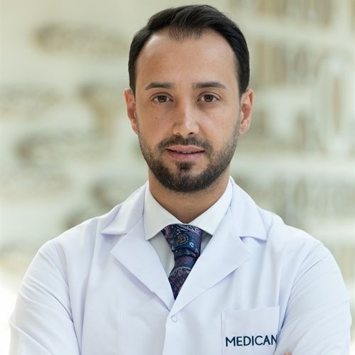 Op. Dr. Erhan Hüseyin Cömert
