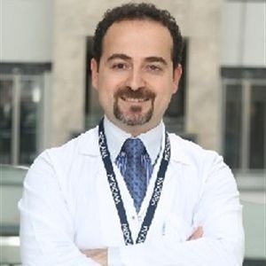 Op. Dr. Nadir Cömert